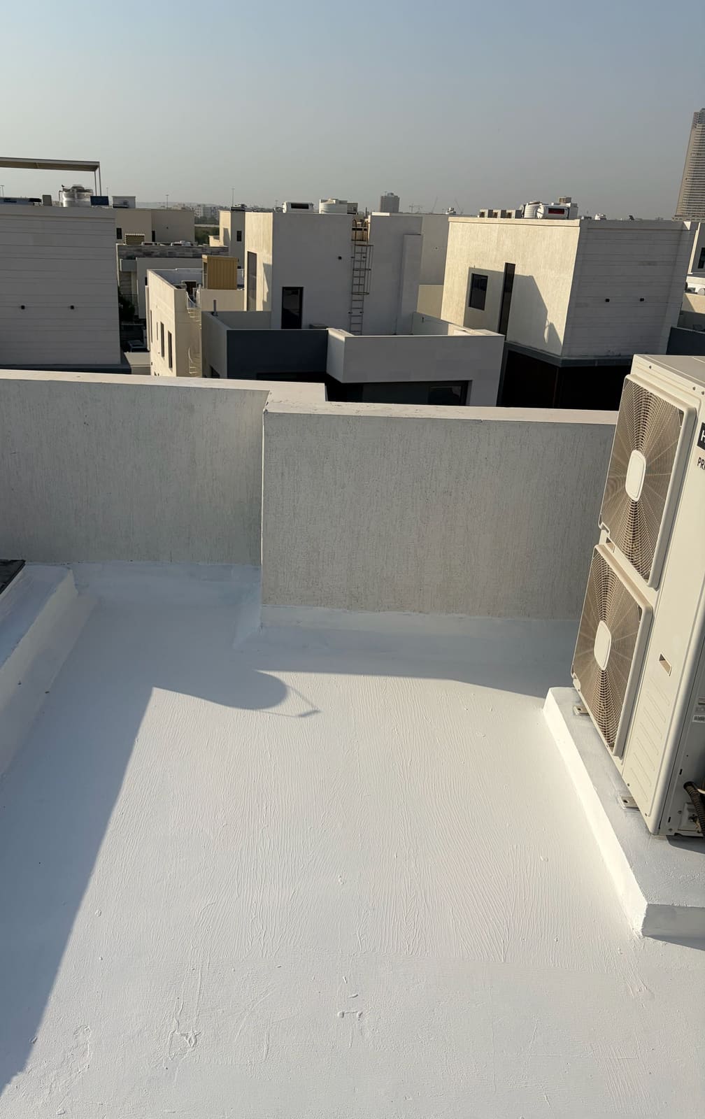 Villa roof finished with a white waterproof coating, Ajman